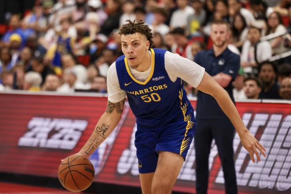 Coleman Hawkins drives to the basket the Golden State Warriors' July 17 NBA Summer League game in Las Vegas.