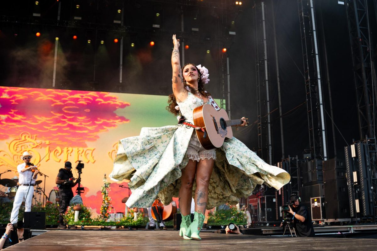 Artist Sierra Ferrell twirls on stage during her set on the first day of Lollapalooza, July 31.