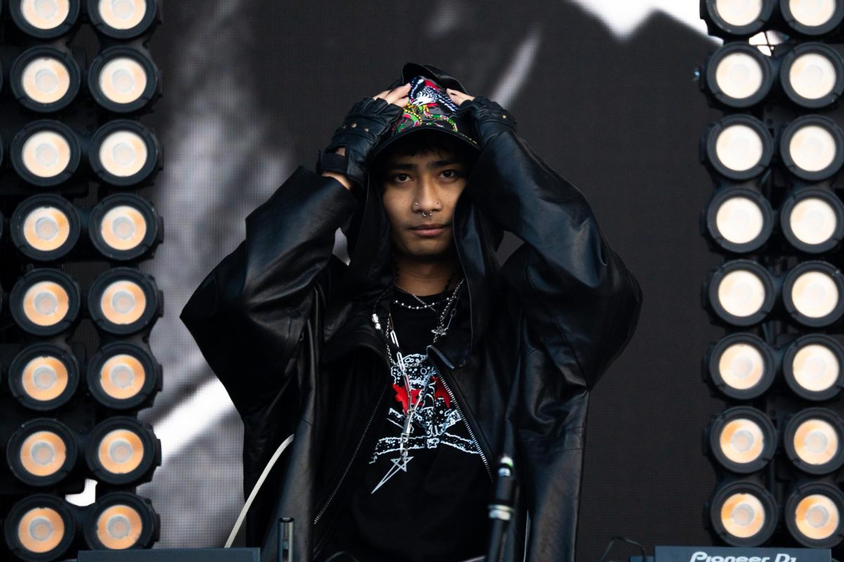 ISOxo stands in front of the massive crowd during his set on Perry's stage on day 2 of Lollapalooza. The show included shooting fire, beach balls, and multiple festival goers passing out. 