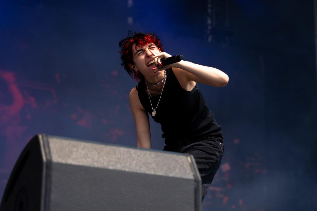 Jane Remover screams into the microphone during their morning set on the Bud Light stage to start day 2 of Lollapalooza.