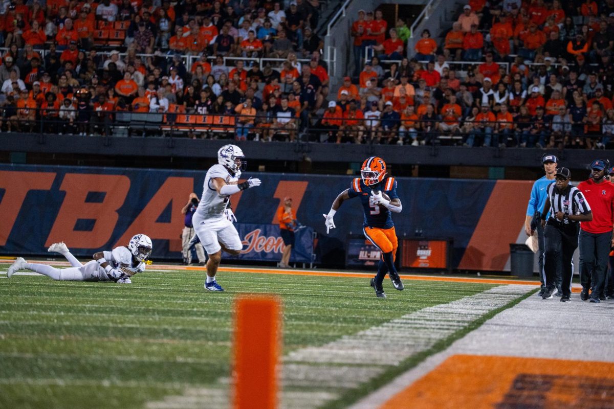 Sophomore running back Ca'lil Valentine rushes the ball against the Western Illinois Leathernecks on Aug. 29. 