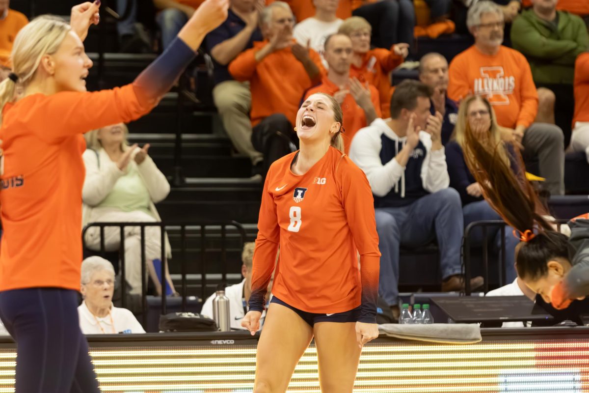 Junior opposite Averie Hernandez brings the energy to close out the second set in an intense five-set match against USC on Nov. 8, 2024, at Huff Hall.