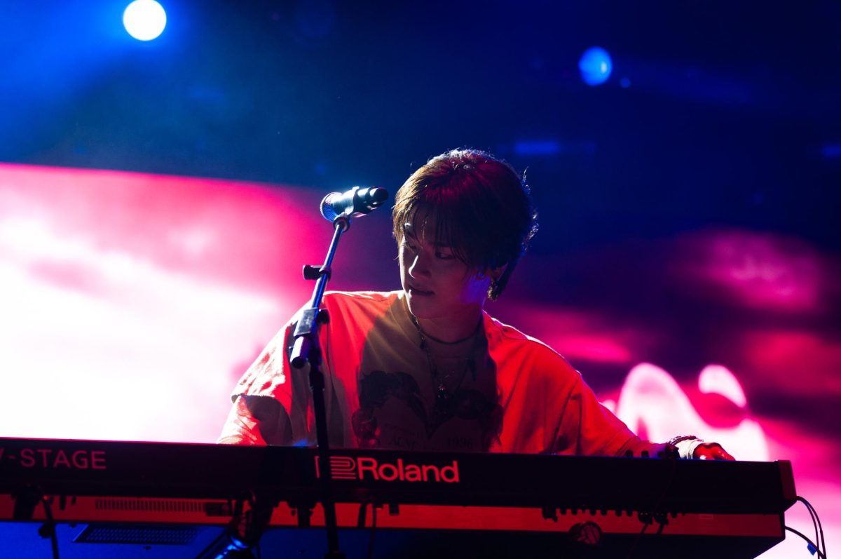 Keyboard player Jungsu rocks at The Grove at Lollapalooza on Thursday.
