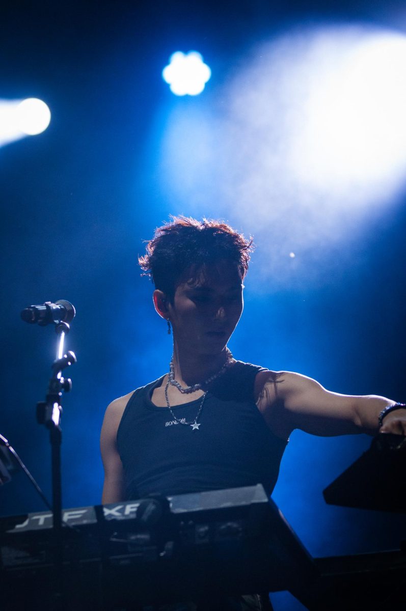 Xdinary Heroes synthesizern player Gun-il gives an electric performance Thursday night at Lollapalooza.