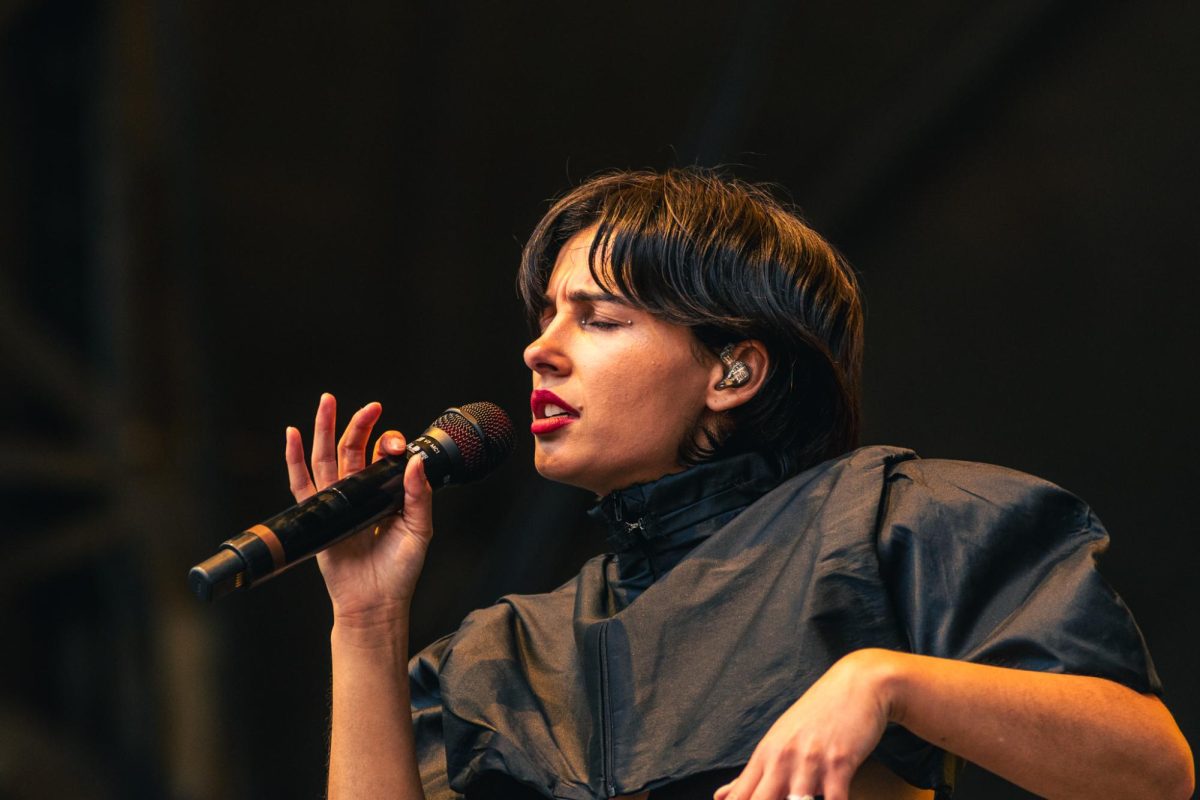 Actress and songwriter Naomi Scott, most well-known for her roles in 'Lemonade Mouth' and 'Smile 2', performs at The Grove stage at Lollapalooza on Saturday.