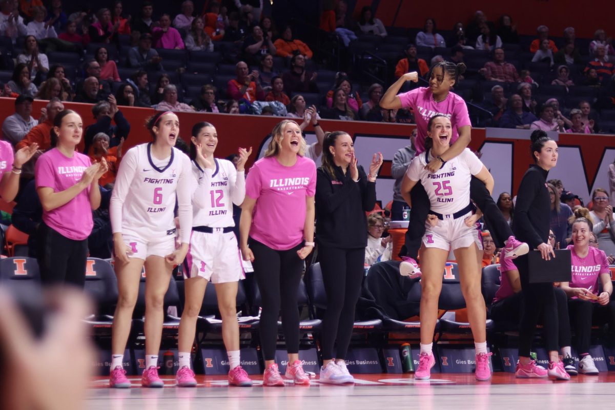 Illinois celebrates during game against Nebraska on Feb. 16 at State Farm Center.