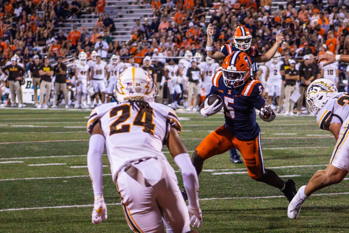 Sophomore running back Ca’Lil Valentine rushes towards the endzone against Western Michigan on Sept. 13.