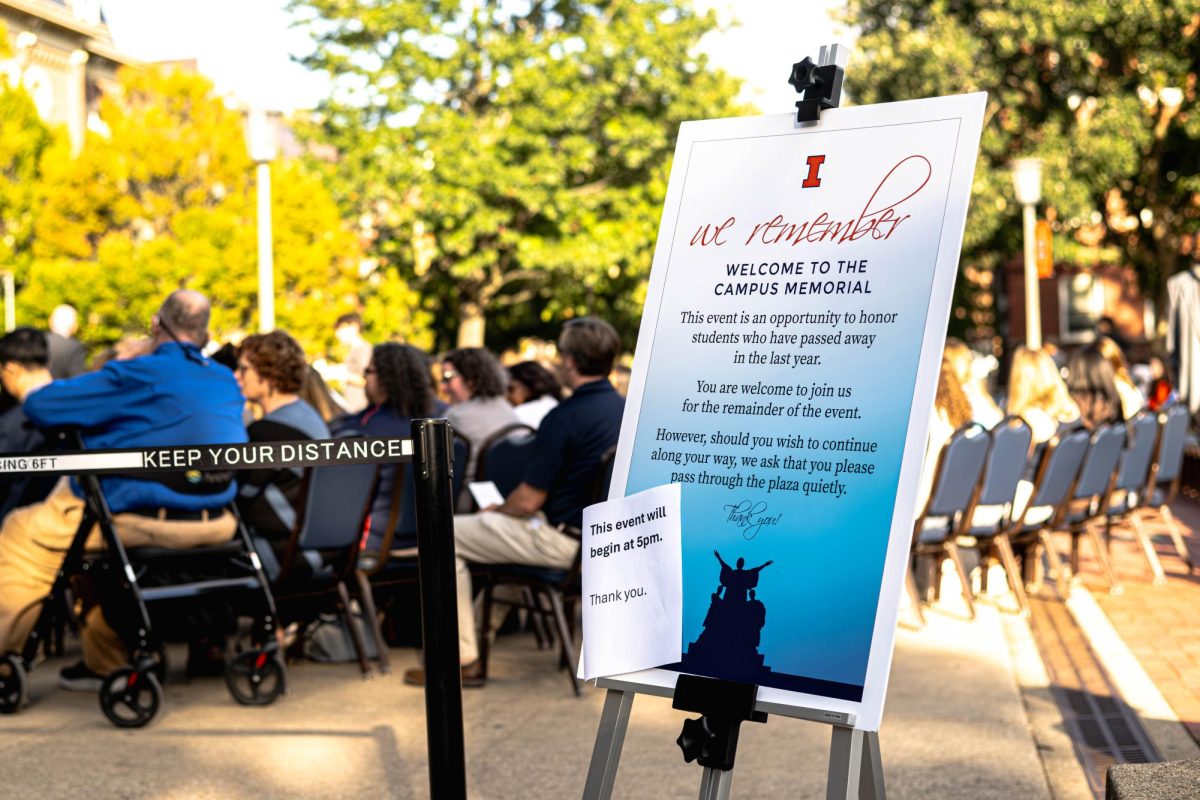 A sign shows stands in front of Anniversary Plaza on Thursday afternoon for the annual student memorial. Students, faculty and community members honored University students who died in the last year. 