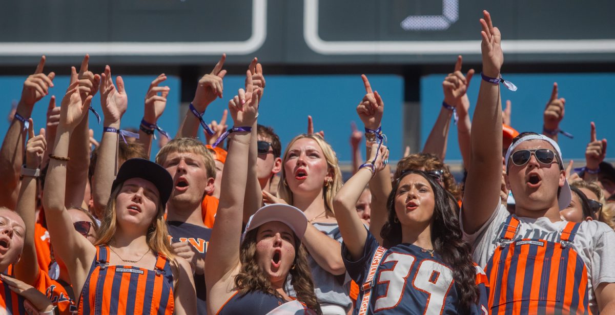 Illinois students chant and jeer from another sold-out student section, filling the north end of the stands at Gies Memorial Stadium for the Illinois Homecoming game on Sept. 27.
