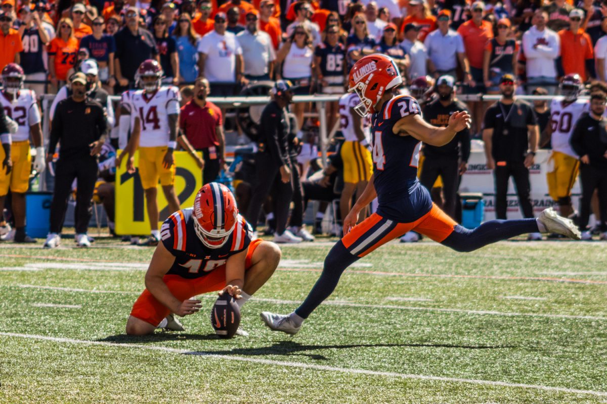 Junior kicker David Olano earns an extra point for the Illini after senior quarterback Luke Altmyer’s first touchdown against the USC Trojans on Sept. 27. 