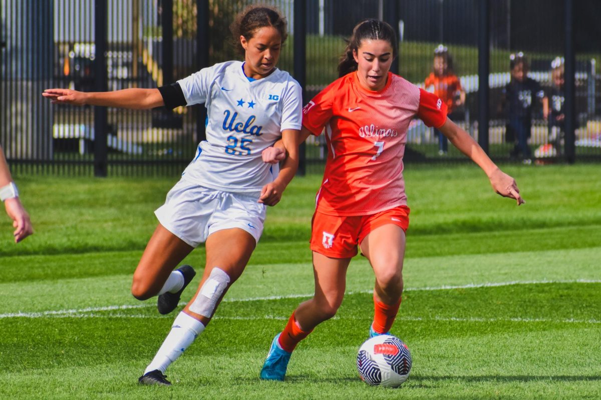 Illinois forward Emma Yee battles with UCLA defender Nicki Fraser during the teams’ match on Oct. 13, 2024. 