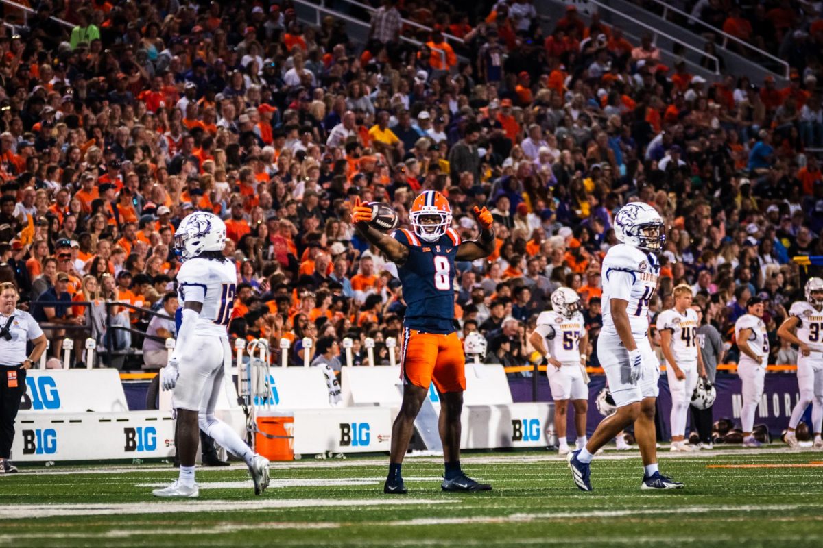 Junior wide receiver Malik Elzy celebrates a catch during Illinois’ game against Western Illinois on Sept. 27.