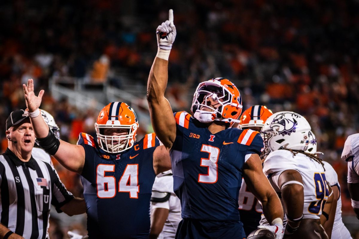 Junior running back Kaden Feagin points skyward during Illinois’ win over the Western Illinois Leathernecks on Aug. 29. 