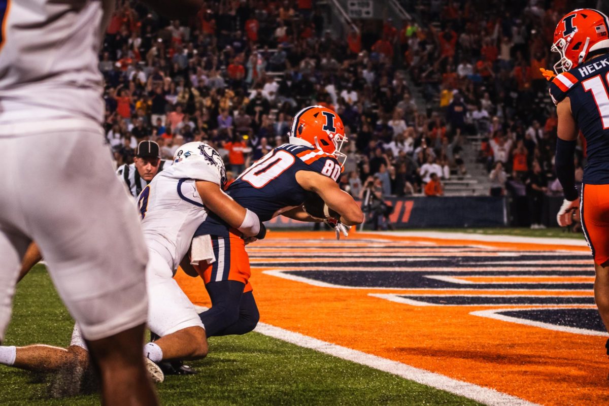 Senior Wide Reciever and Punt Returner Hank Beatty returns a Western Illinois punt for 69 yards, breaking Red Grange's 102 year-old record.