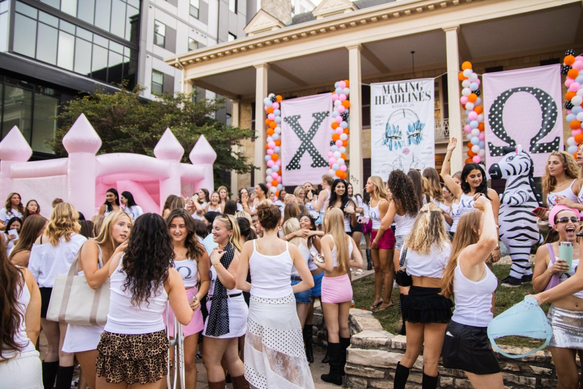 Members of Chi Omega celebrate welcoming new members to their sorority after Bid Day on Sept. 15.