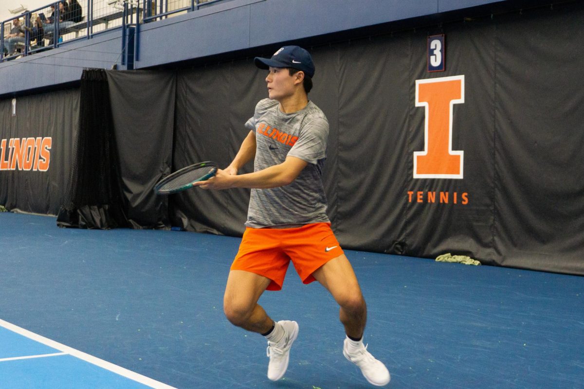 Junior Jeremy Zhang waits for a return hit during the Illini’s home meet on Feb. 15.