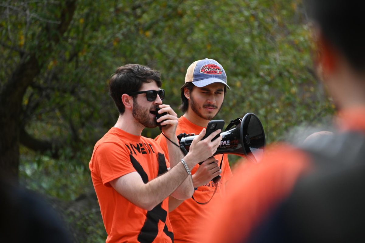 Grayson Hodson addresses the crowd through a megaphone at the March for Our Climate on Sept. 19.
