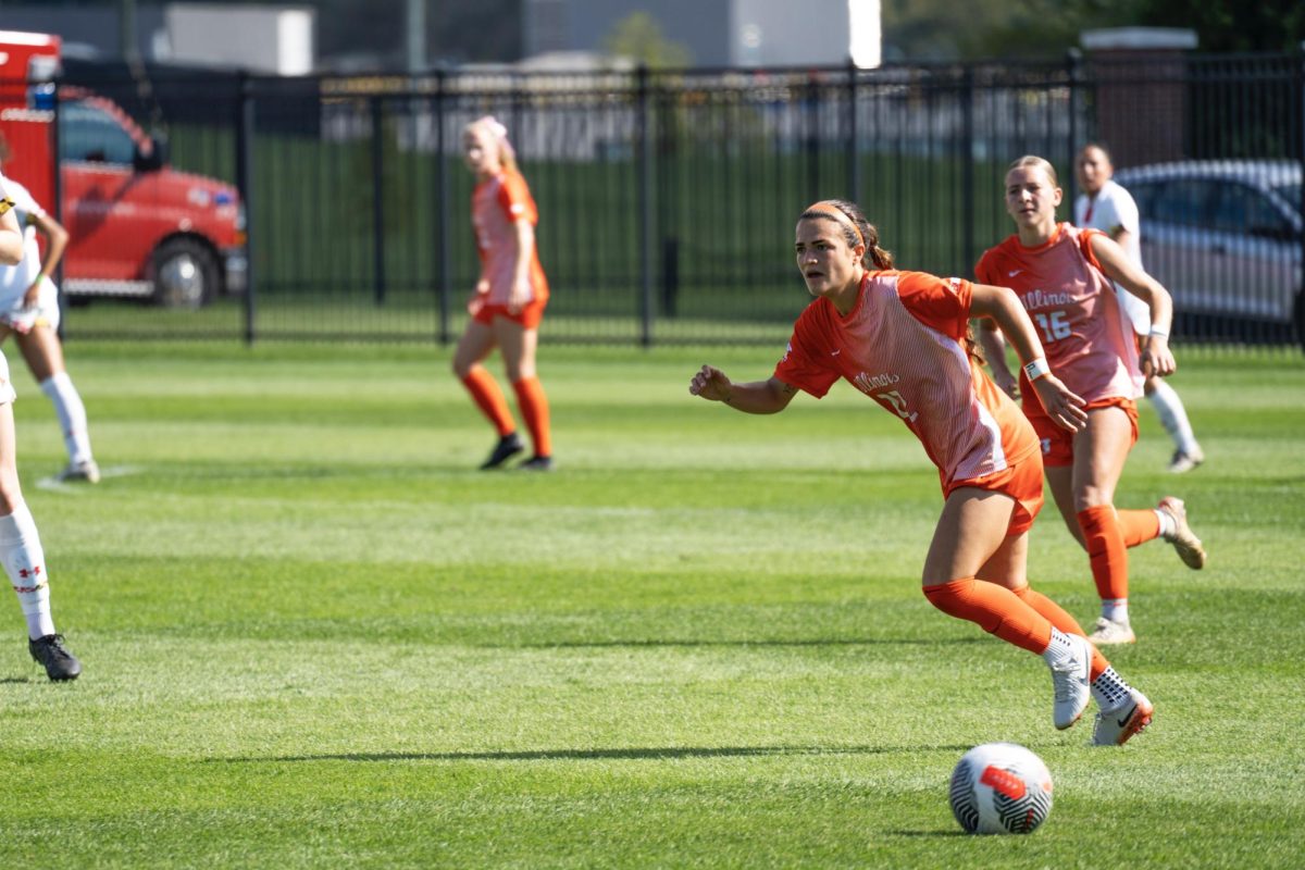 Forward Lia Howard runs towards the ball during Illinois’ game against Maryland on Sept. 29, 2024.