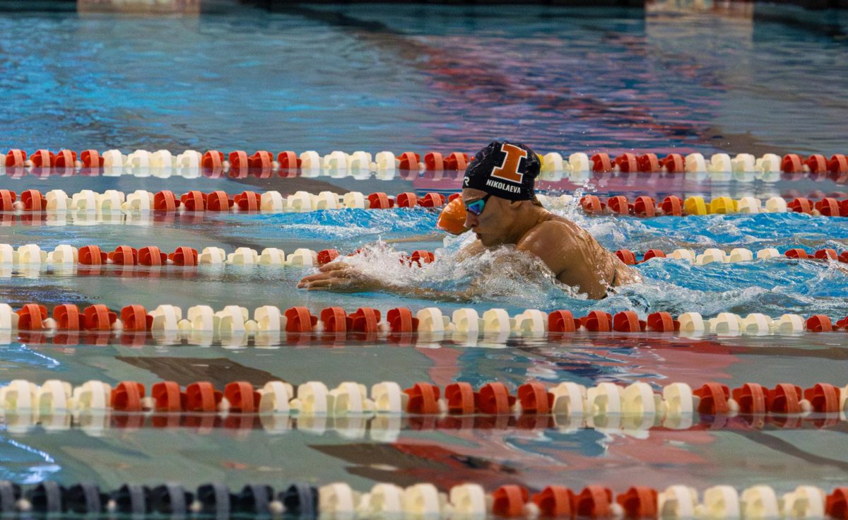 Junior swimmer Kalina Nikolaeva cuts through the water at the ARC Pool during the intersquad Orange v. Blue meet on Oct. 4.  