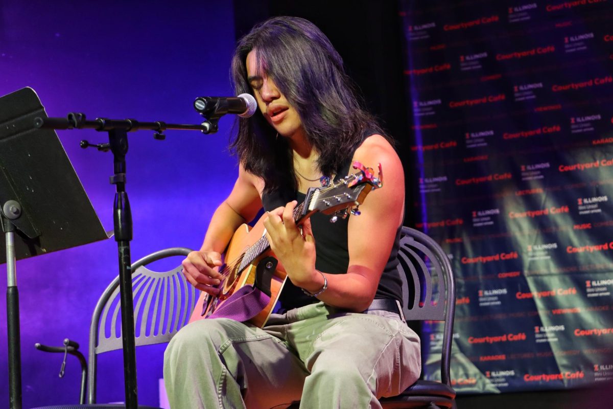 Sophomore guitarist and vocalist Damian Ruel Vergara Salinas of FAA, also known as “damianruel,” performs an original piece titled “see u” on Oct. 6. Individuals can attend Musical Mondays for free at the Illini Union every Monday starting at 7pm in the Courtyard Cafe.