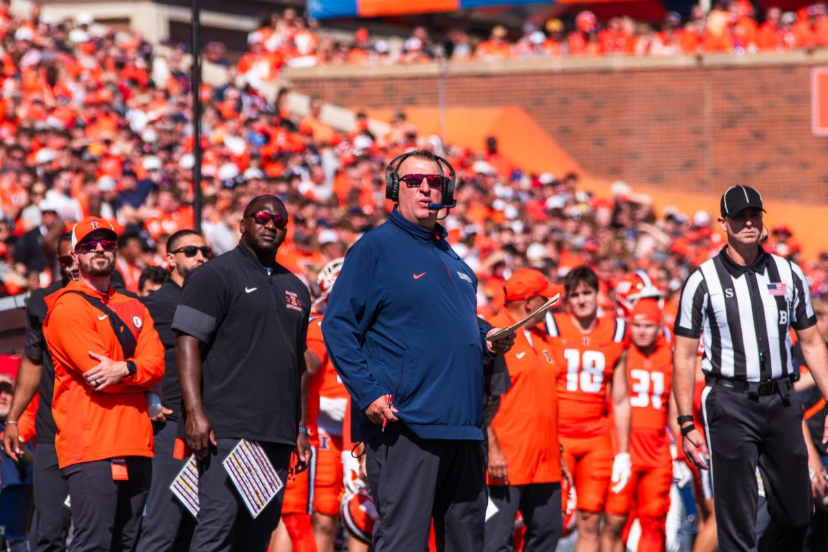 Illinois head coach Bret Bielema looks towards the scoreboard at Gies Memorial Stadium during the game against Ohio State on Oct. 11.