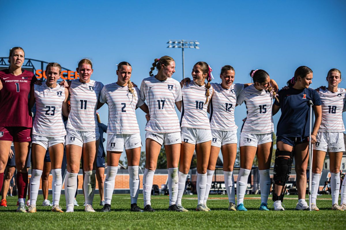 The Illini line up following the team’s final home game against the Purdue Boilermakers on Oct. 12. 