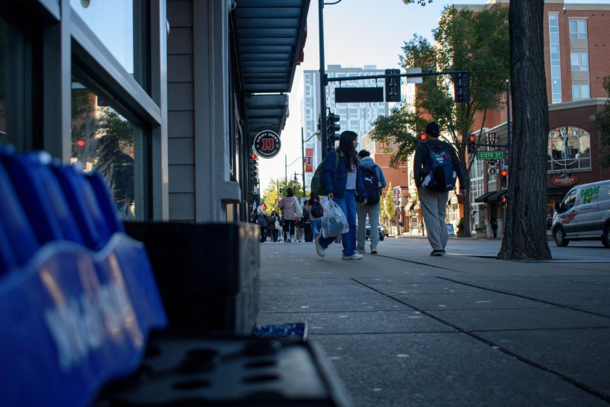 Four crates sit in front of the Dunkin’ Donuts on Green Street in Champaign on Oct. 23. These crates are just a few of the many that homeless members of the community will sit on or put their belongings in throughout the day.
