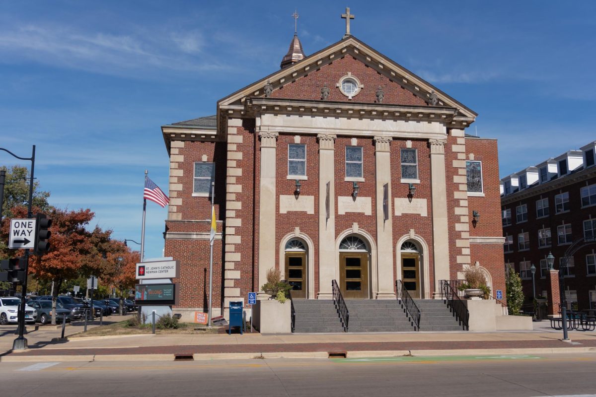 Newman Hall — a private certified residence hall at the University — stands at 604 E. Armory Ave. in Champaign on Friday. The residence hall's dining room — operated by Upper Crust Food Service — was reinspected by the Champaign-Urbana Public Health District Tuesday and will reopen Wednesday.