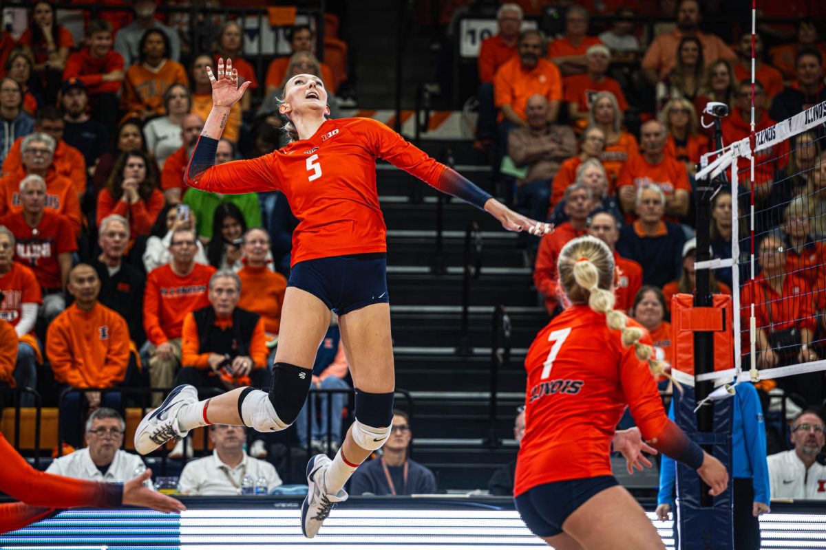 Redshirt sophomore outside hitter Taylor de Boer leaps to return a hit against Purdue on Oct. 24.