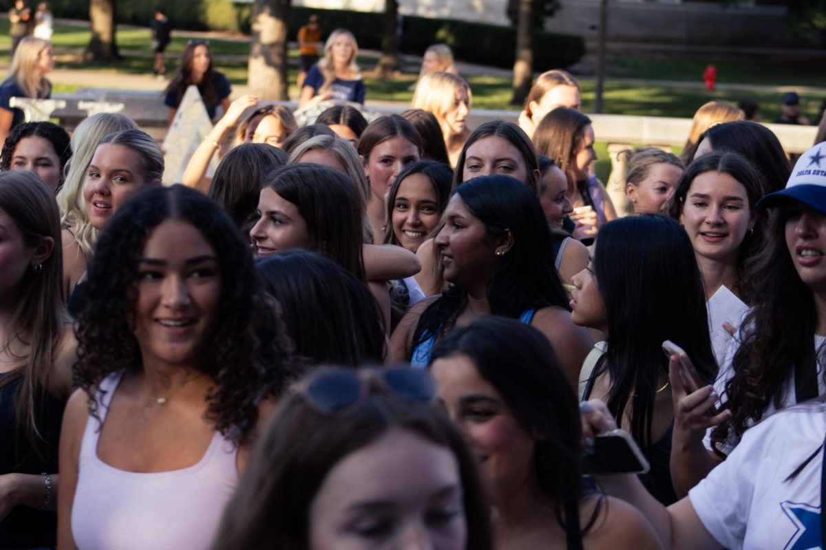 New members and their chapters run back to their sorority houses during Bid Day on Sept. 9, 2024.