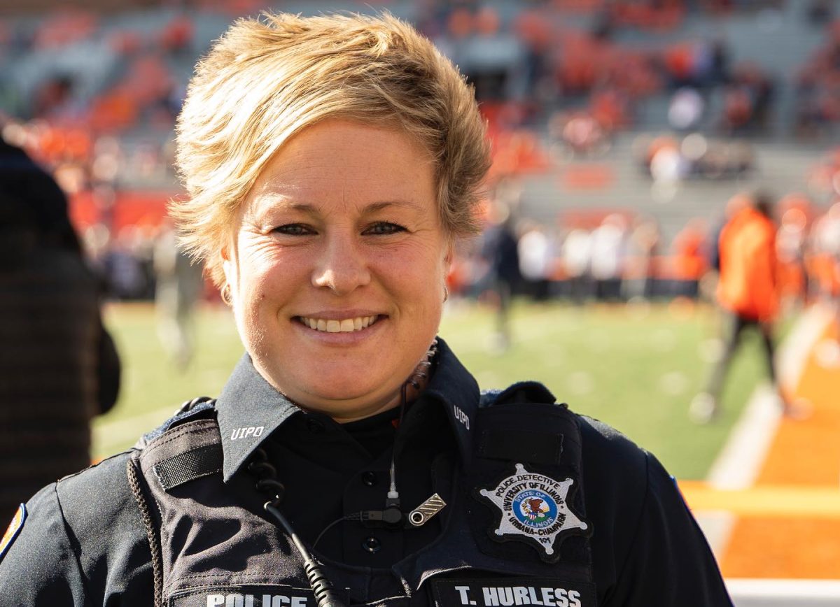 University soccer alum and current UIPD officer Tara Hurless stands on shift during a Homecoming football game at Gies Memorial Stadium in 2023. Hurless played soccer at the University.