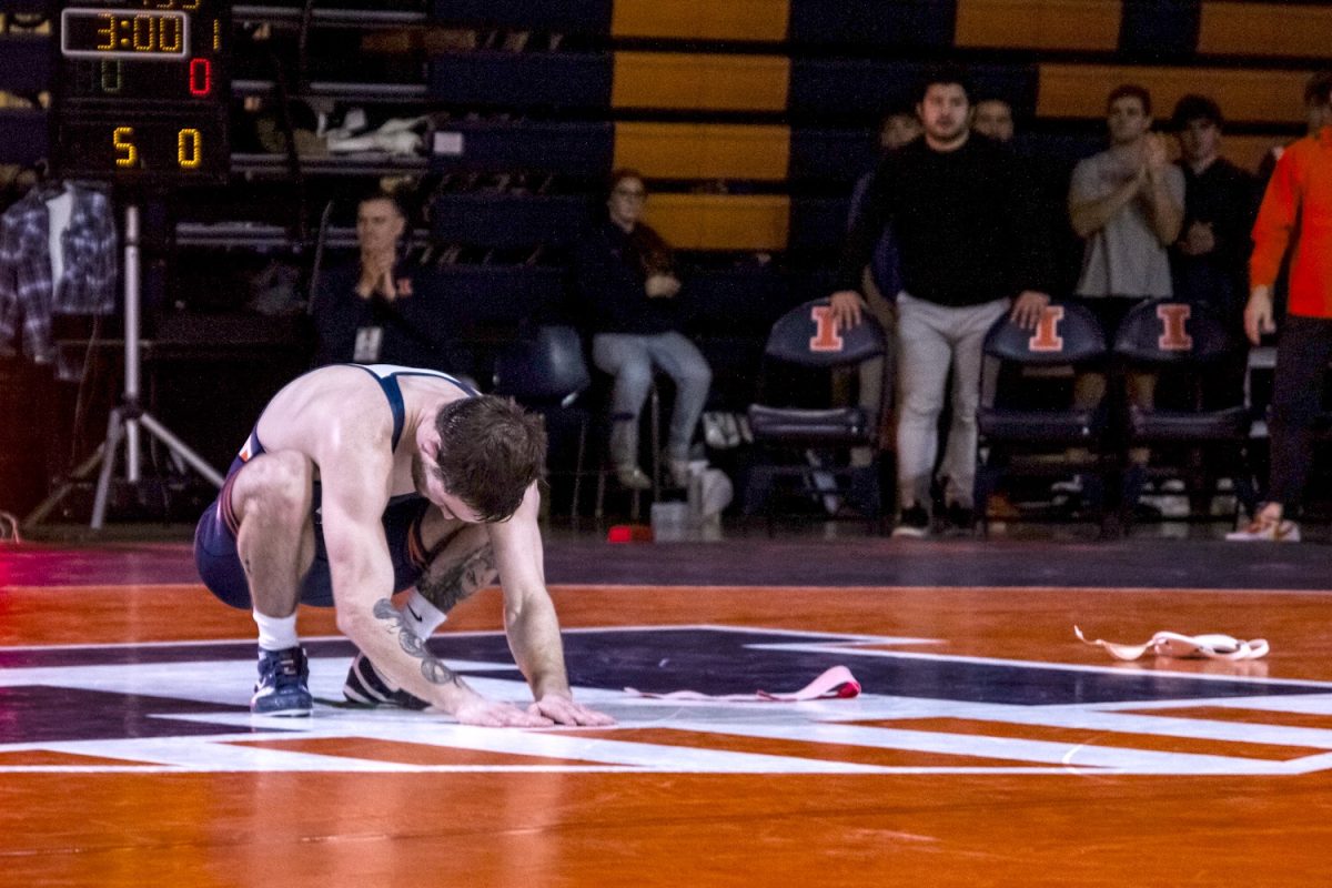 Redshirt senior Lucas Byrd acknowledges the crowd after his last regular-season win of 2025 at Illinois' final dual meet of the season against No. 1 Penn State on Feb. 16. 