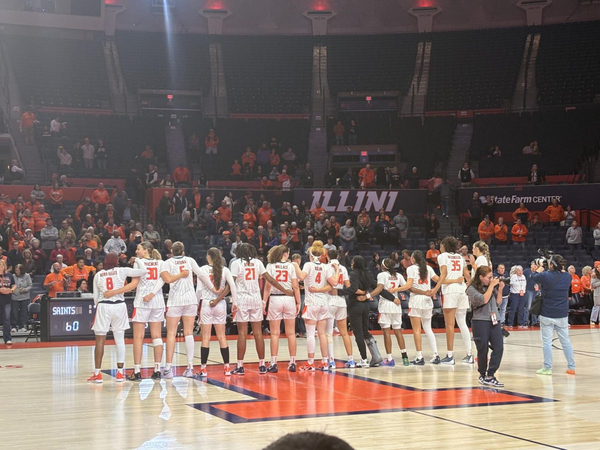 The Illini line up on the court after their 79-60 win against the Maryville Saints on Thursday.
