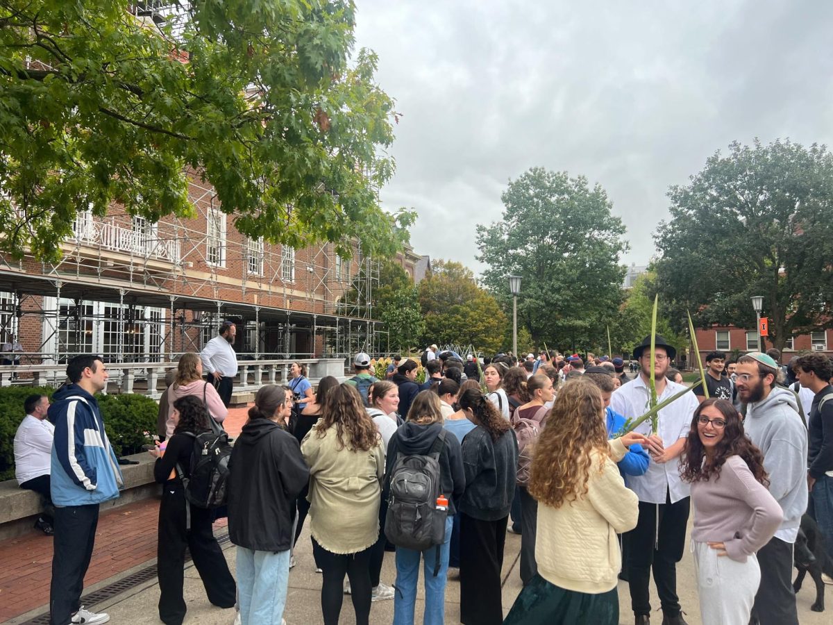 Community members gather at Anniversary Plaza for an Oct. 7, 2023, memorial and to celebrate the Jewish holiday Sukkot. 