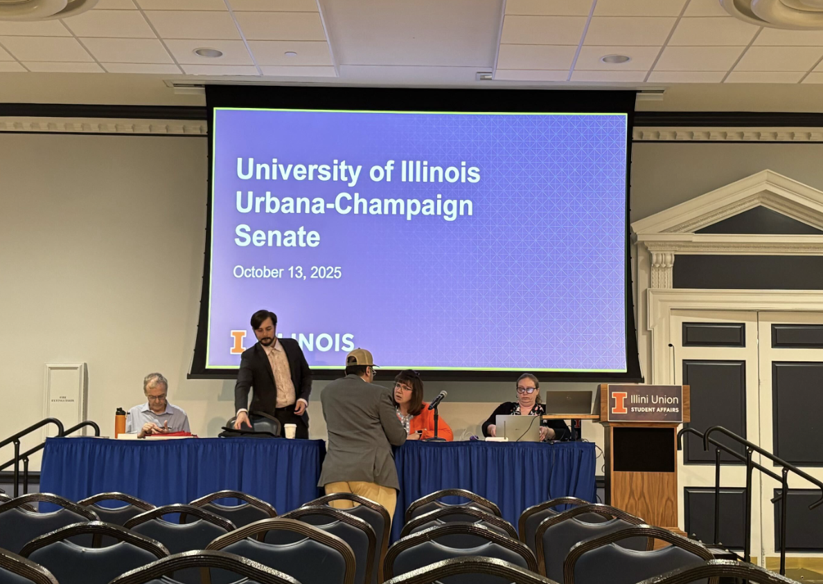 University senators sit at a panel at their monthly meeting on Monday. Several senators expressed overwhelming disapproval toward recent updates to the honorary degree award process.