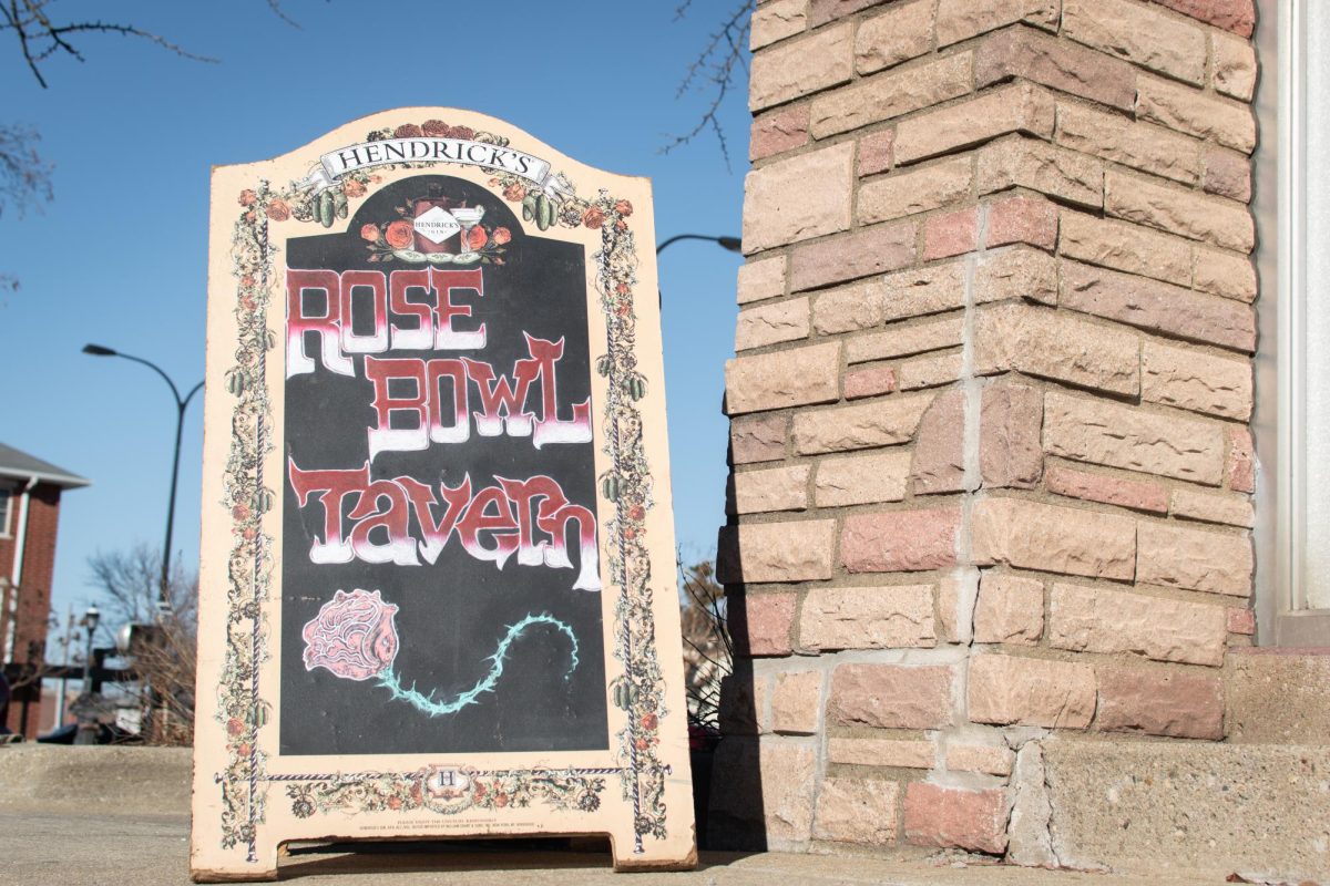 A sign advertising The Rose Bowl Tavern on Race street in Urbana on Feb. 28, 2024.