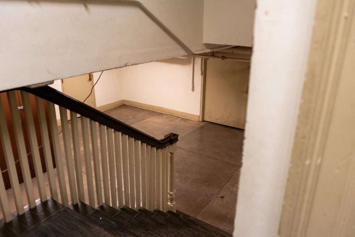 A stairwell leads down to the basement of the English Building. Once said to be the Women's Dorm, the basement allegedly held the pool where the woman drowned.