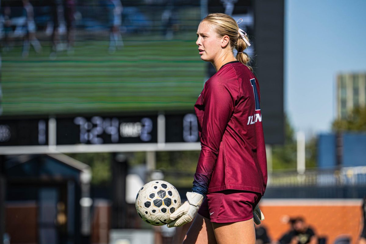 Redshirt junior goalkeeper Izzy Lee holds the ball during Illinois’ match against Purdue on Oct. 12.