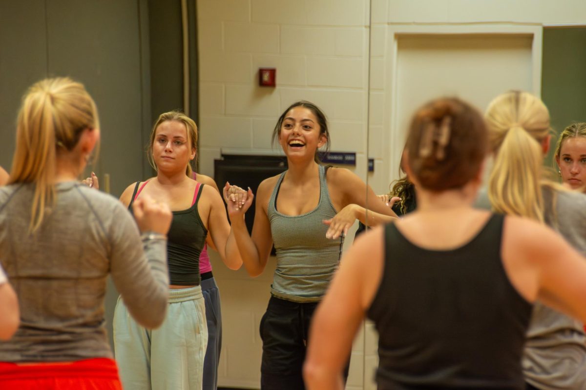 Ana Raquel, senior in LAS and president of Vitality Dance Team, leads practice for the Greek affiliated dance team on Wednesday evening.