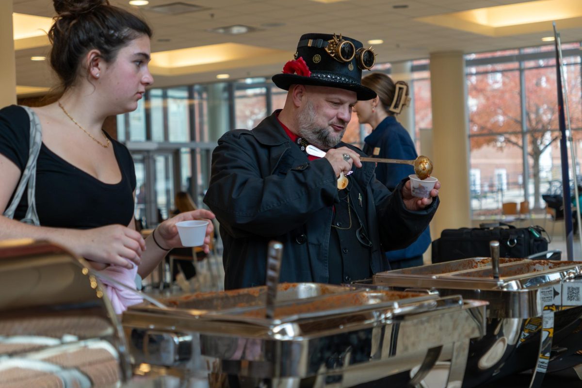 Students enjoy chili at the Student Dining and Residential Programs cookoff at the SDRP building on Friday. The competition featured various chili recipes prepared by students and staff competing for the top spot.