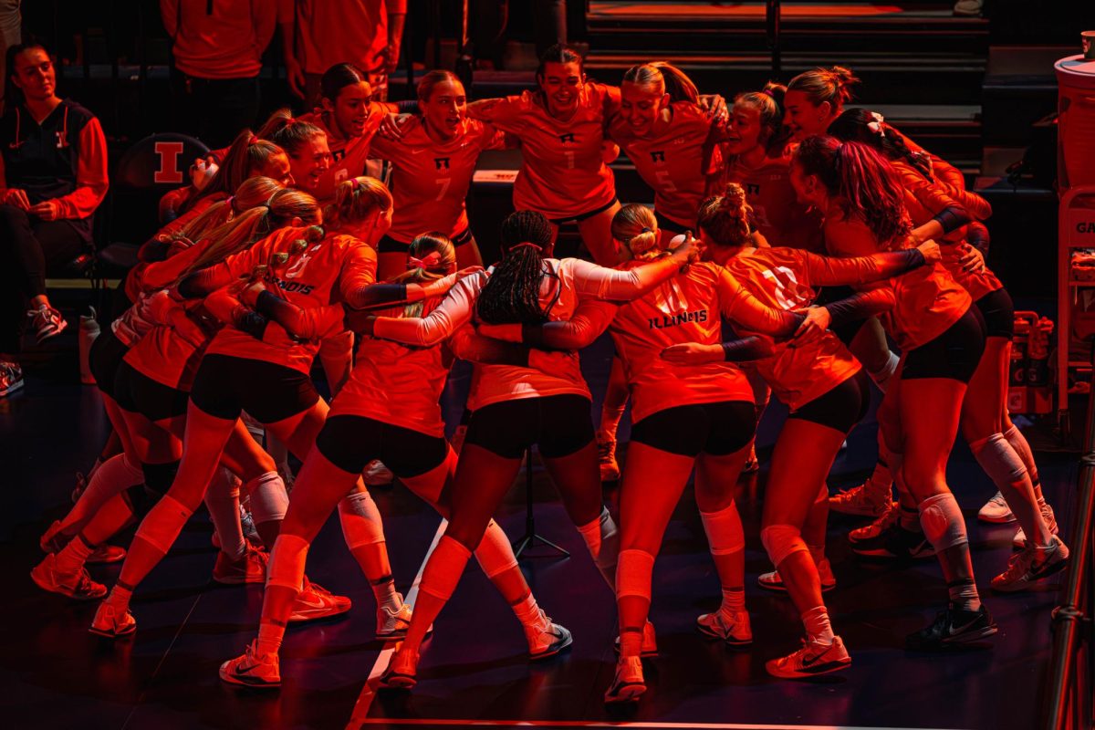 The Illini huddle ahead of their game against the Iowa Hawkeyes on Nov. 2. 