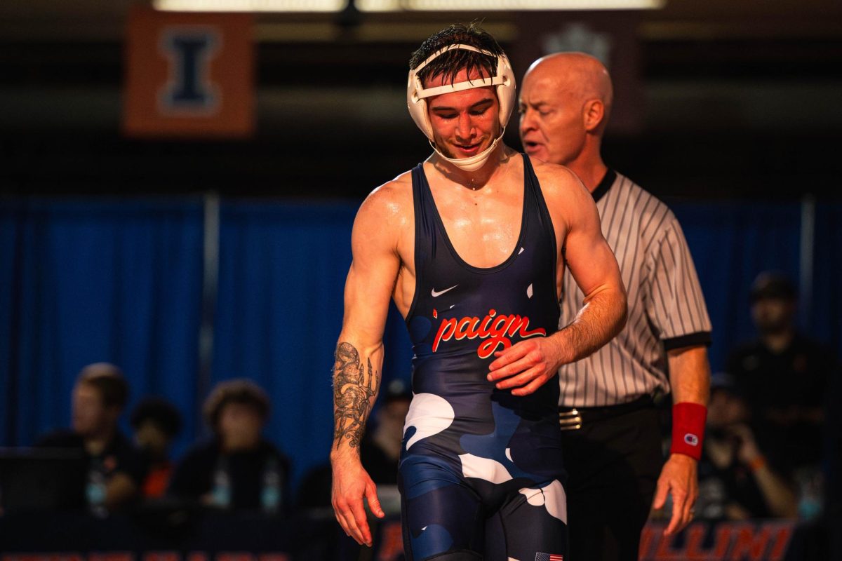 133-pound graduate student Lucas Byrd stands victorious after his win over Rider’s Will Betancourt on Nov. 8. 