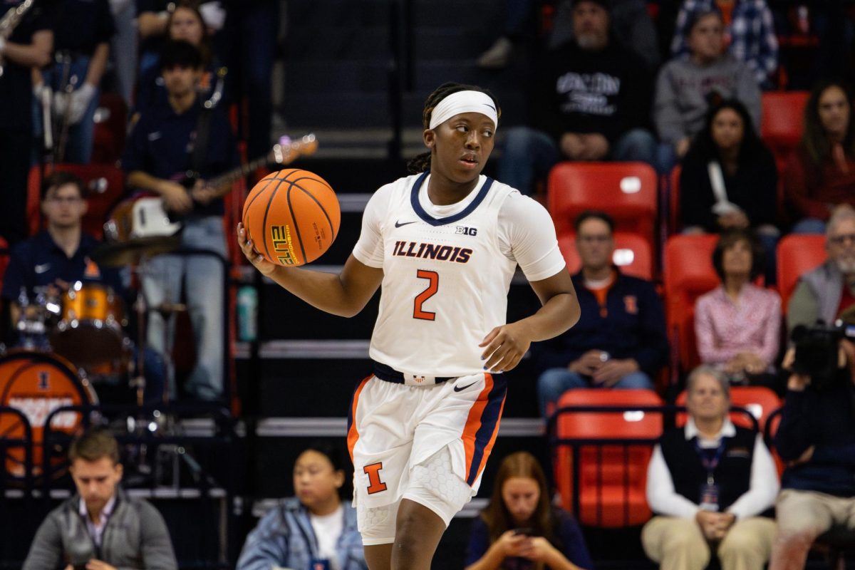 Freshman guard Destiny Jackson dribbles towards Illinois State's defense on Nov. 9 at the State Farm Center. The Illini beat the Redbirds 75-65.