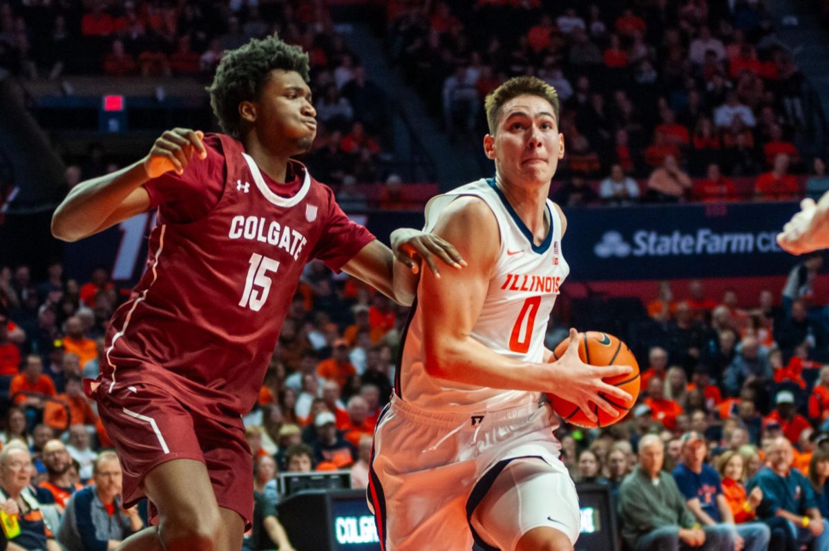 Illini freshman forward David Mirković drives toward the basket against Colgate on Nov. 14 at State Farm Center.
