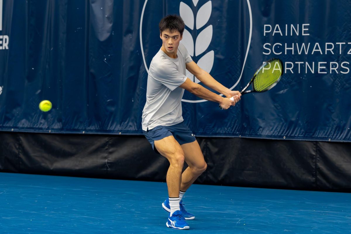 Senior Kenta Miyoshi prepares to return the ball against Taym Al Azmeh during the ATP Champaign Challenger on Nov. 14. 
