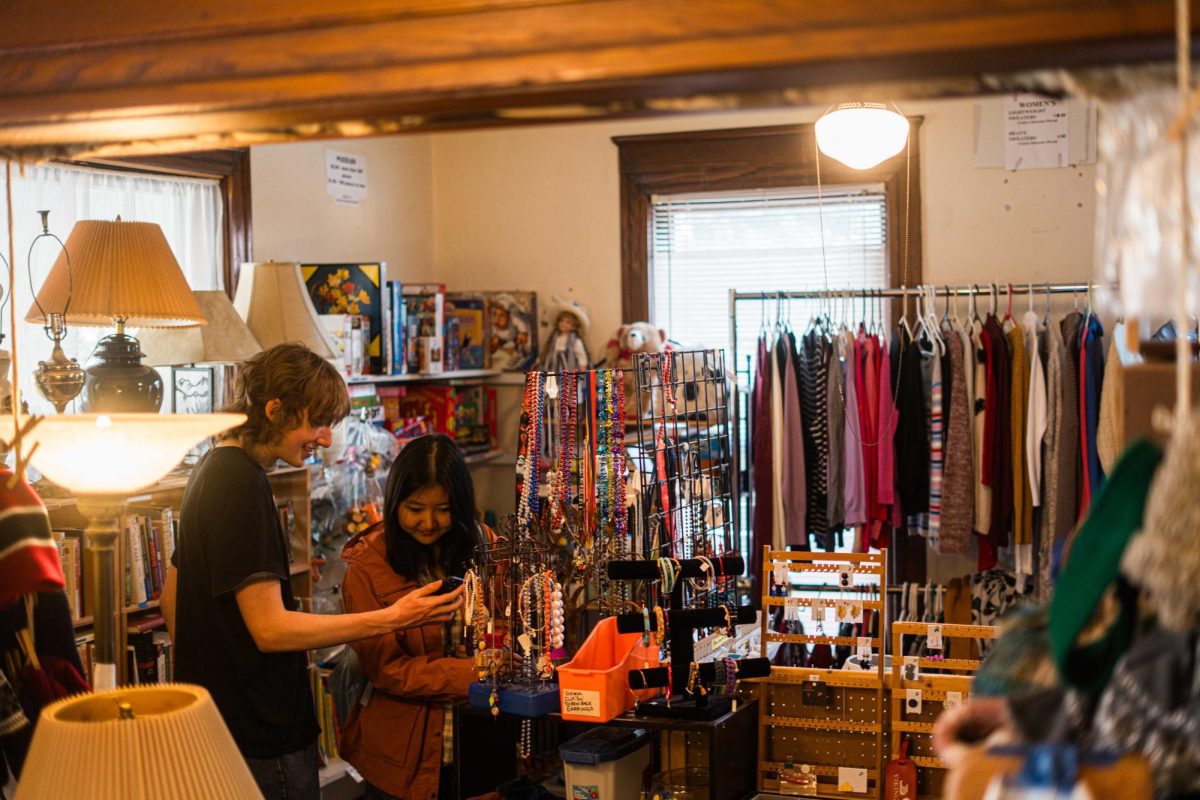 Two customers peruse the items inside of the Twice As Nice thrift shop located 607 W. Elm St. in Urbana on Nov. 15.