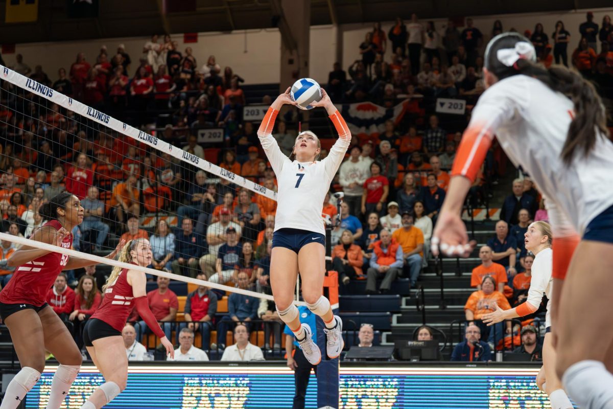 Junior setter Kenna Phelan sets the ball during Illinois’	match against Wisconsin on Nov. 15. 