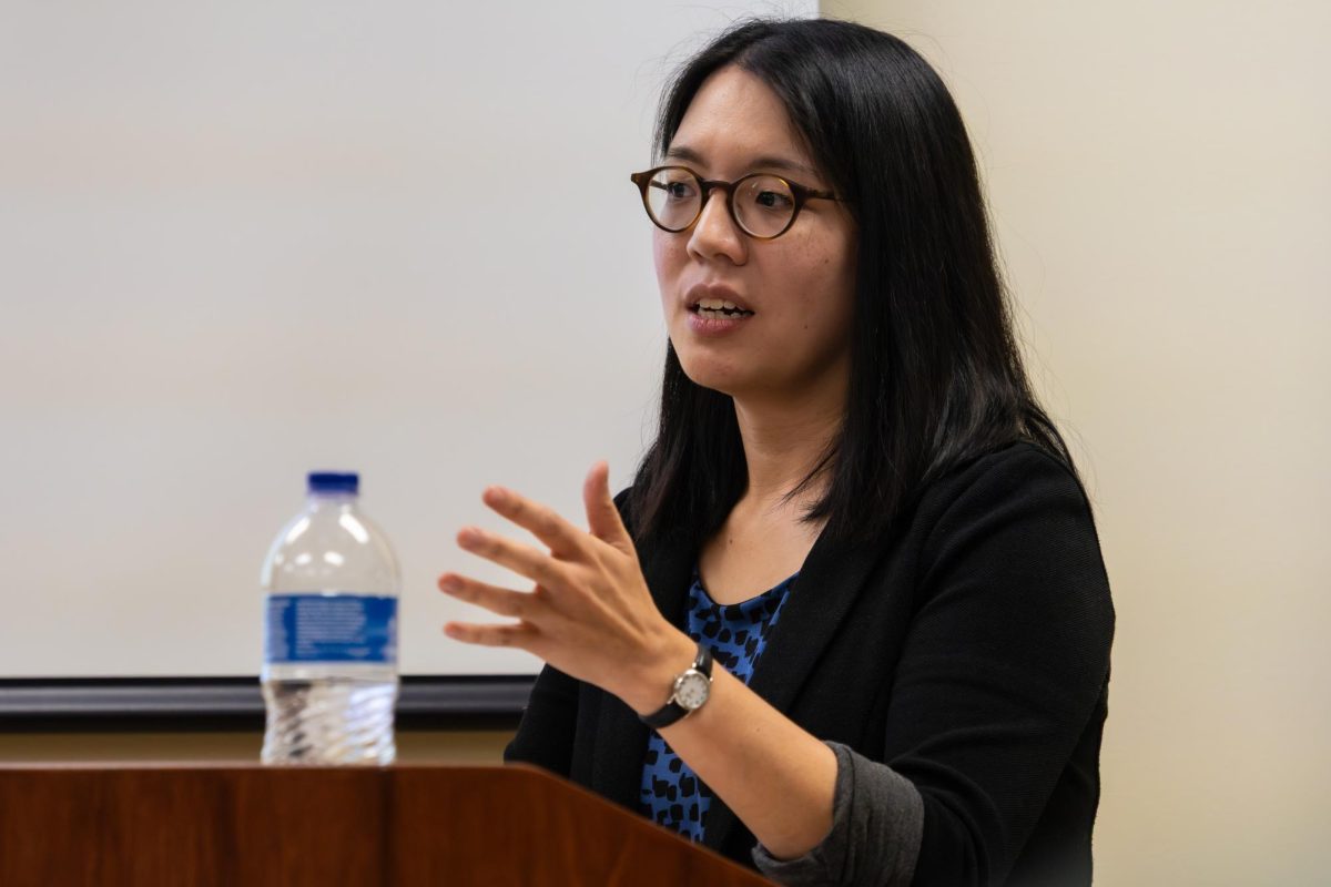 Kelley Fong, assistant professor of sociology at the University of California, Irvine, answers a question at the 18th annual Brieland Lecture on Nov. 19 at the Illinois' School of Social Work. Fong presented the fears and her own research on how Child Protective Services can affect families. 