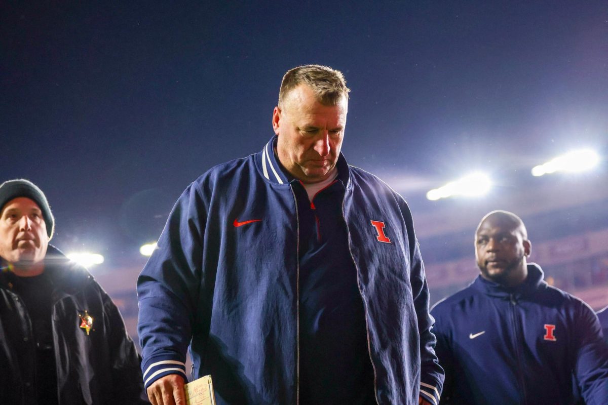Illinois' head coach Bret Bielema walks off the field following the team's 27-10 loss to the Wisconsin Badgers on Nov. 22. 