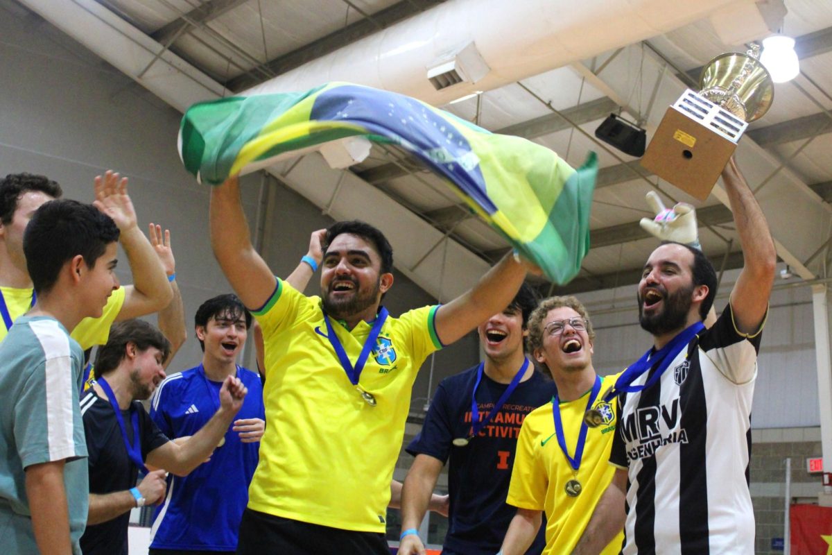 The Brazilian team celebrates its victory in the Indoor World Cup on Saturday. The annual tournament is hosted by International Student and Scholar Services at CRCE.